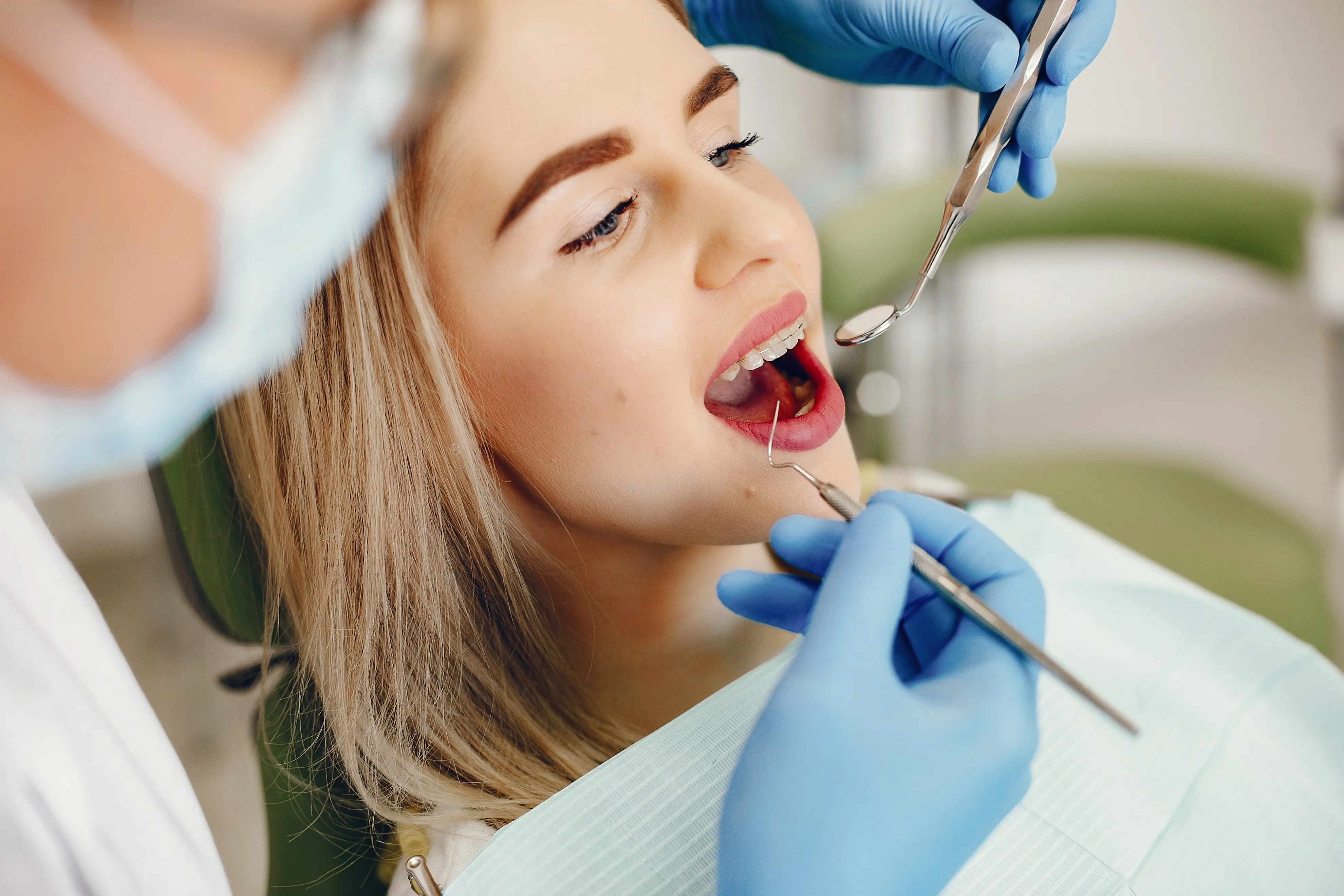 Beautiful Girl Sitting In The Dentist's Office